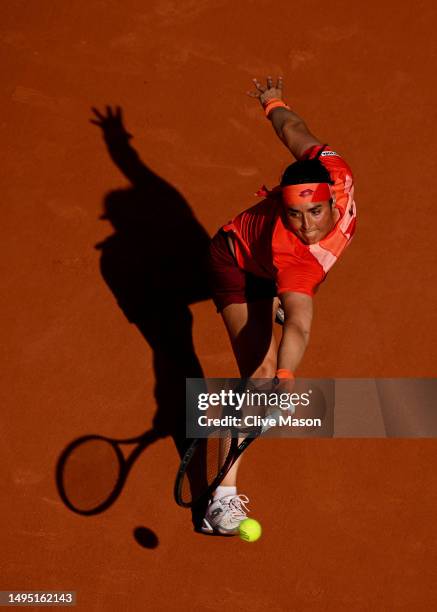 Ons Jabeur of Tunisia plays a backhand against Oceane Dodin of France during the Women's Singles Second Round match on Day Five of the 2023 French...