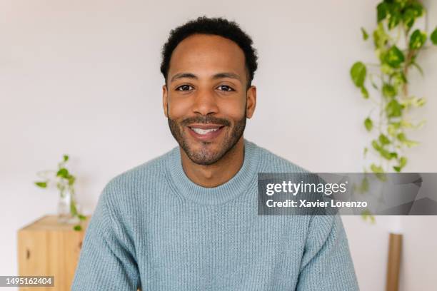 pov or point of view of young adult african american man talking on video call. webcam view. - zoom stock pictures, royalty-free photos & images