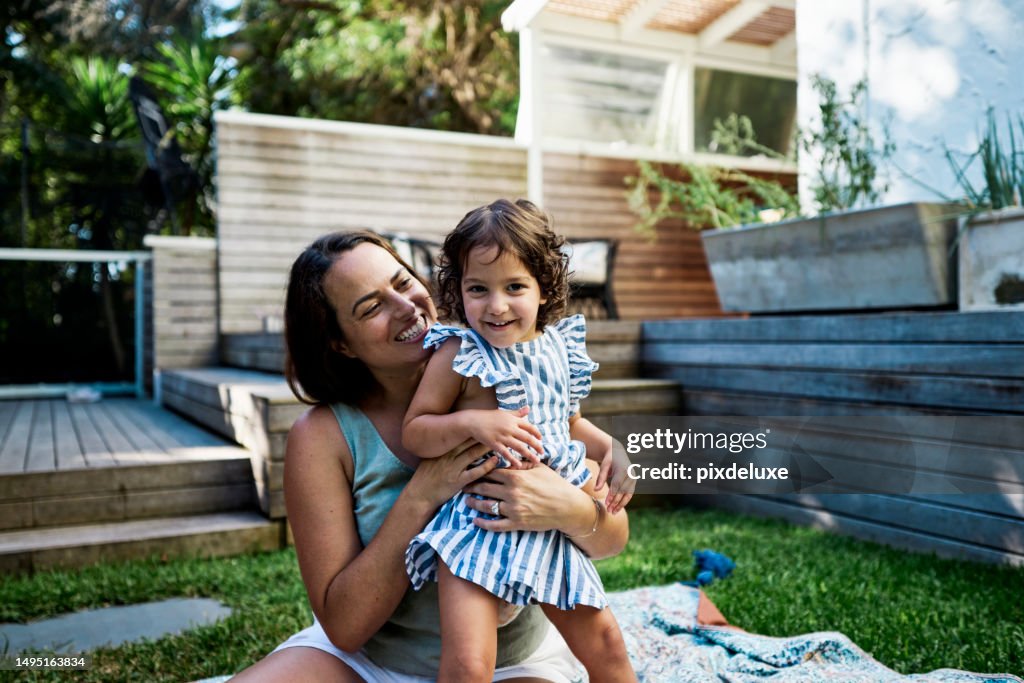 Love, Laughter, and Backyard Adventures: A Mother and Her Child Creating Cherished Memories Outdoors
