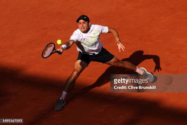 Aslan Karatsev plays a forehand against Frances Tiafoe of United States during the Men's Singles Second Round match on Day Five of the 2023 French...