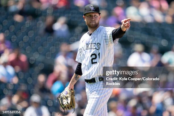 Kyle Freeland of the Colorado Rockies points to a teammate during a break in the action against the Miami Marlins at Coors Field on May 25, 2023 in...