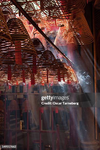 burning incense coils, man mo temple - tarneberg oscar stock pictures, royalty-free photos & images