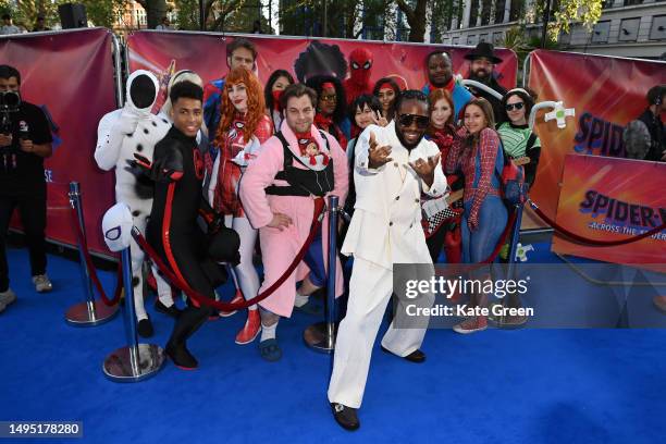 Shameik Moore poses with fans in fancy dress at the "Spider-man: Across The Spider-Verse" Gala Screening at Cineworld Leicester Square on June 01,...