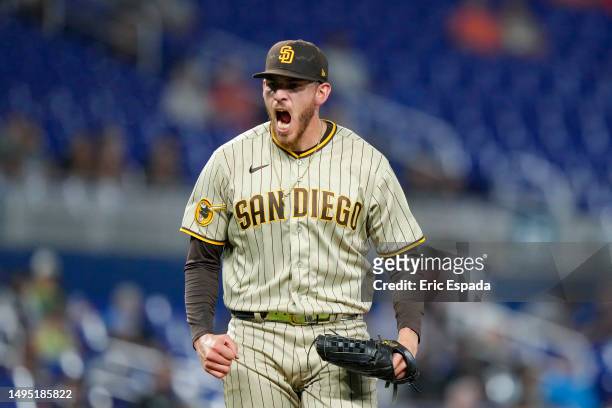Joe Musgrove of the San Diego Padres reacts after striking out Yuli Gurriel of the Miami Marlins to end the sixth inning at loanDepot park on June...