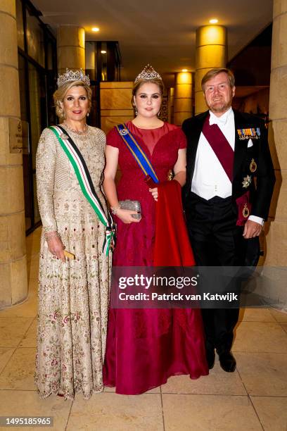 Queen Maxima of The Netherlands, Princess Amalia of The Netherlands and King Willem-Alexander of The Netherlands leave their hotel for the wedding...