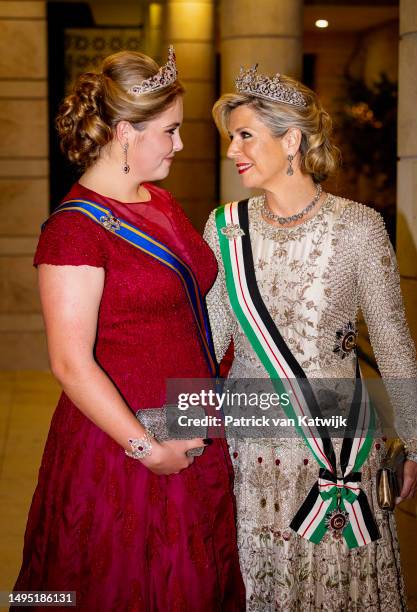 Princess Amalia of The Netherlands and Queen Maxima of The Netherlands leave their hotel for the wedding banquet of Crown Prince Al Hussein Bin...