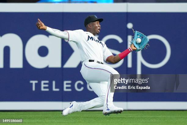 Jesus Sanchez of the Miami Marlins makes a sliding catch during the third inning against the San Diego Padres at loanDepot park on June 01, 2023 in...