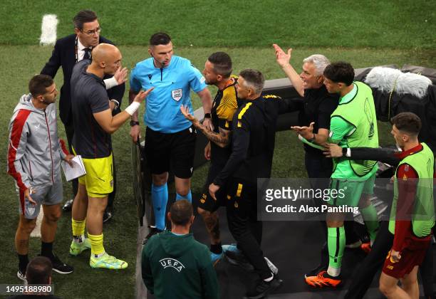 Jose Mourinho, Head Coach of AS Roma, confronts Marko Dmitrovic of Sevilla FC during the UEFA Europa League 2022/23 final match between Sevilla FC...