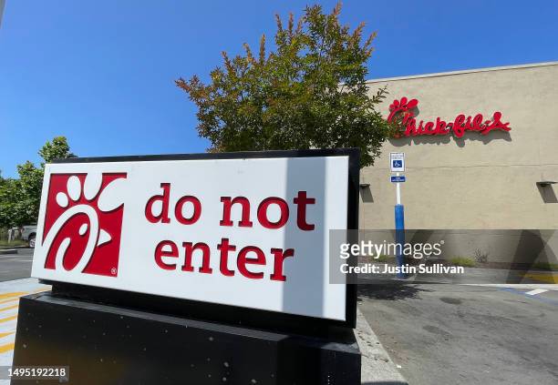 Sign is posted in front of a Chick-fil-A restaurant on June 01, 2023 in Novato, California. The fast food chain is drawing criticism on social media...