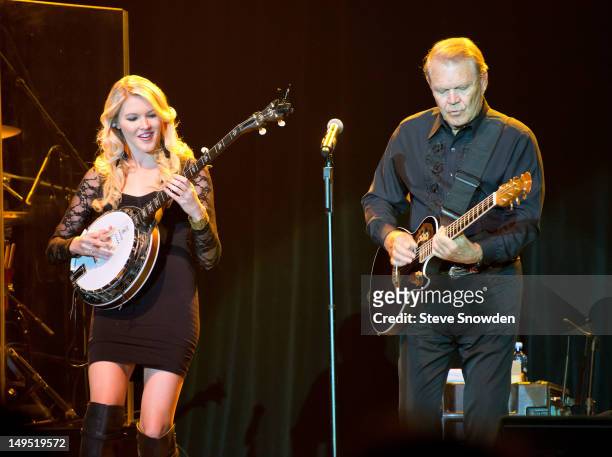 Glen Campbell performs on stage with his daughter Ashley during his Goodbye Tour at Route 66 Casino's Legends Theater on July 29, 2012 in...