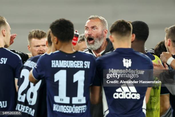 Tim Walter, Head Coach of Hamburger SV, speaks to his players after the team's defeat in the Bundesliga playoffs first leg match between VfB...