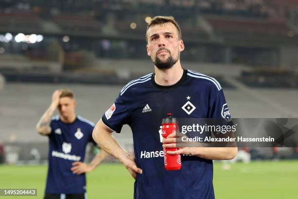 Jonas Meffert of Hamburger SV looks dejected following the team's defeat in the Bundesliga playoffs first leg match between VfB Stuttgart and...