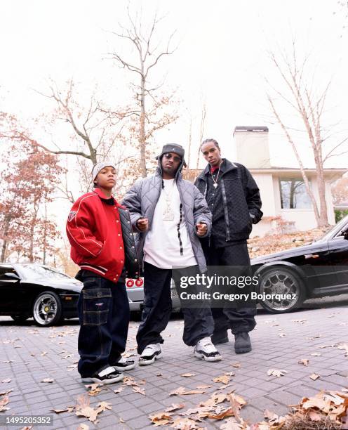 Musicians Jermaine Dupri, Bow Wow and R.O.C. Pose for a photo in November, 2001 in Atlanta, Georgia.