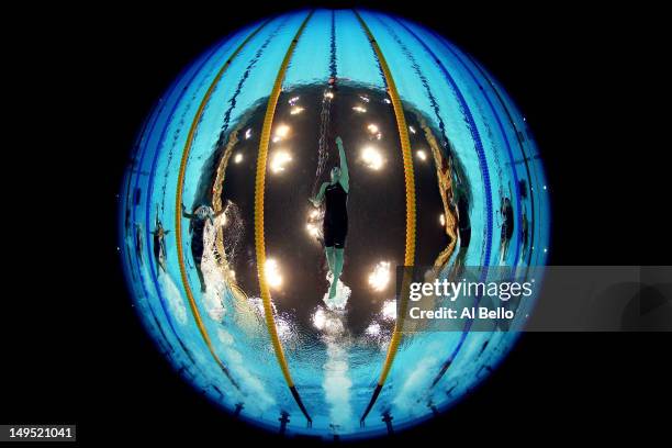 Federica Pellegrini of Italy, Missy Franklin of the United States and Veronika Popova of Russia compete in heat 3 of the Women's 200m Freestyle on...