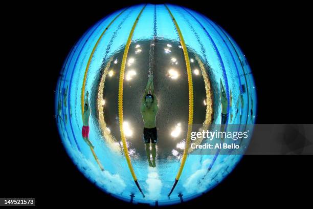 Bence Biczo of Hungary, Takeshi Matsuda of Japan and Laszlo Cseh of Hungary compete in heat 4 of the Men's 200m Butterfly on Day 3 of the London 2012...