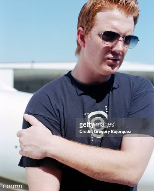 Musician Josh Homme of the rock group Queens of the Stone Age pose for a photo at Van Nuys Airport in September, 2002 in Van Nuys, California.