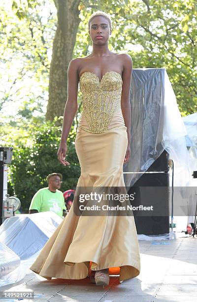 Model walks the stage at Harlem Week's 38th Anniversary Celebration at Ulysses S. Grant National Memorial Park on July 29, 2012 in New York City.