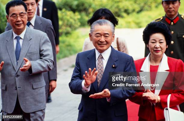 View of, fore from left, Chinese Premier Li Peng and married couple, Japanese Prime Minister Noboru Takeshita & Naoko Endo, during a State Visit by...