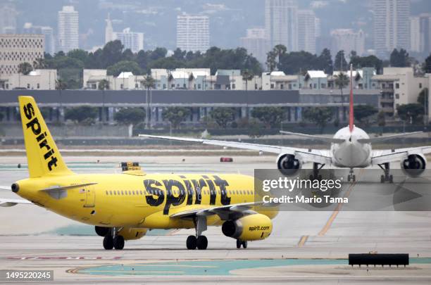 Spirit Airlines plane taxis at Los Angeles International Airport on June 1, 2023 in Los Angeles, California. Over 40 percent of Spirit Airlines...