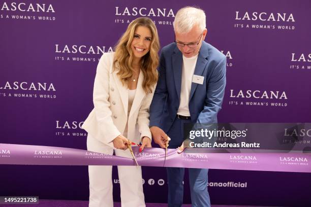Victoria Swarovski and Olaf Koopmann cut the ribbon during the LASCANA Fashion Store Pre-Opening on June 01, 2023 in Cologne, Germany.