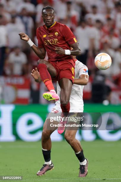 Tammy Abraham of AS Roma anticipates Loic Bade of Sevilla to the ball during the UEFA Europa League 2022/23 final match between Sevilla FC and AS...