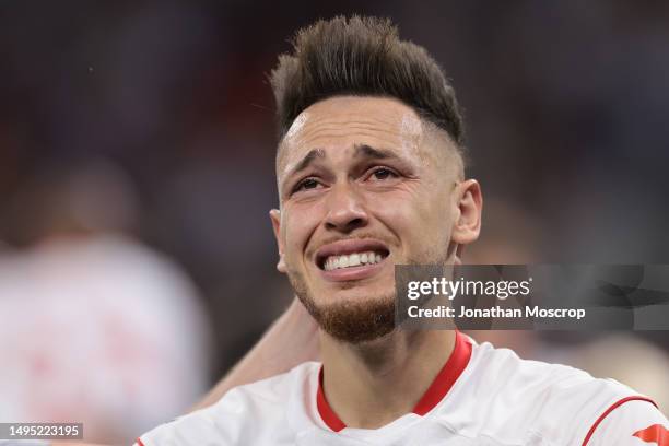Lucas Ocampos of Sevilla reacts following the penalty shoot out victory in the UEFA Europa League 2022/23 final match between Sevilla FC and AS Roma...