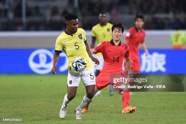 Oscar Zambrano of Ecuador battles for the ball with Kang Sangyoon of Korea Republic during a FIFA U-20 World Cup Argentina 2023 Round of 16 match...