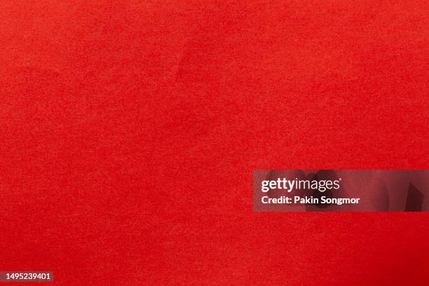 red paper sheet texture cardboard background. - fondo rojo fotografías e imágenes de stock