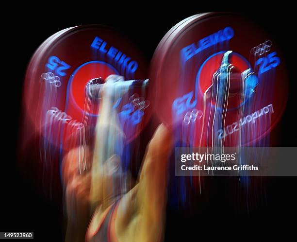Saad Ahmed Mohamed of Egypt competes in the Men's 62kg Weightlifting on Day 3 of the London 2012 Olympic Games at ExCeL on July 30, 2012 in London,...