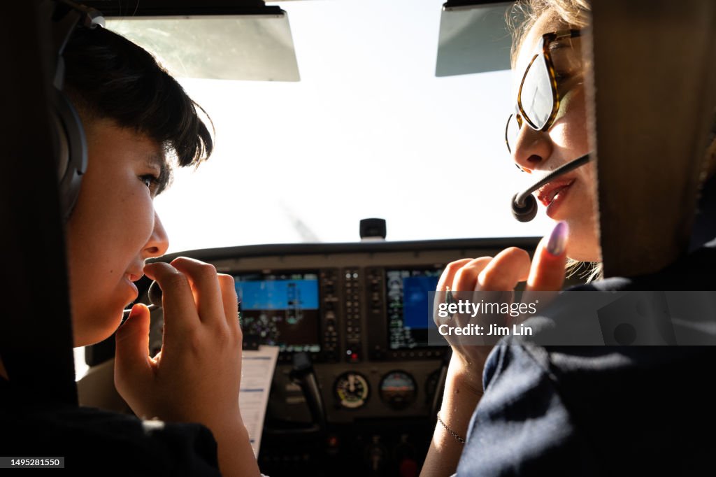 Toing Flight A Boy Taking His First Flight Class With A Experienced Flight ...