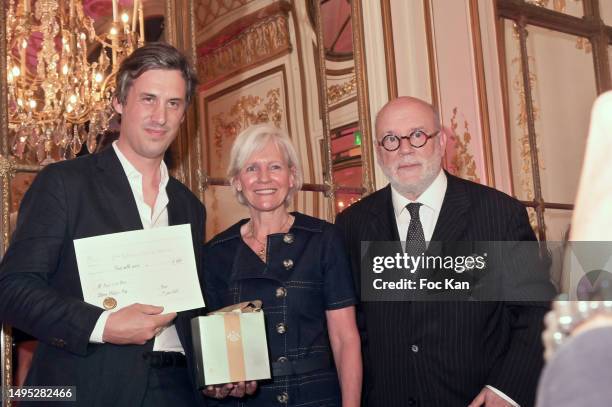 Meurice Literary award 2023 recipient Paul Saint Bris for his book « L’allègement Des Vernis », President Franka Holtmann and Marc Lambron attend...