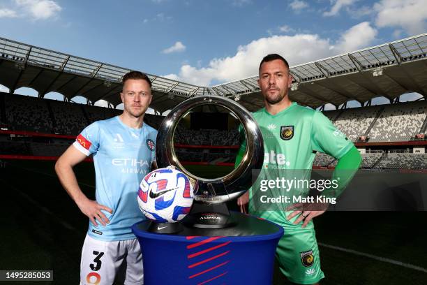 Melbourne City FC captain Scott Jamieson and Central Coast Mariners captain Danny Vukovic pose with the A-League Men's trophy during the A-League...