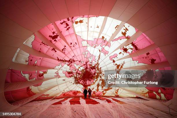 Balloonists inflate the canopy of the BBC balloon at the start of the the three day Midlands Air Festival at Ragley Hall on June 02, 2023 in...