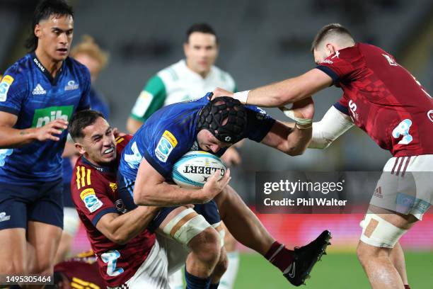 James Tucker of the Blues is tackled during the round 15 Super Rugby Pacific match between Blues and Highlanders at Eden Park, on June 02 in...