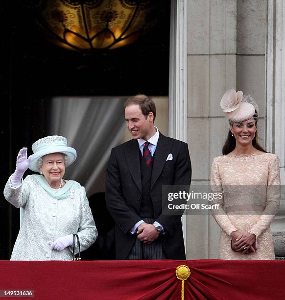 Queen Elizabeth II, Prince William, Duke of Cambridge and Catherine, Duchess of Cambridge on the balcony of Buckingham Palace after the service of...