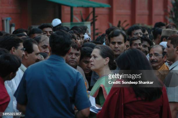 Congress President Sonia Gandhi meeting party workers at the launch of Mahirshi Balmiki Yatra in New Delhi on Monday, October 17, 2005.