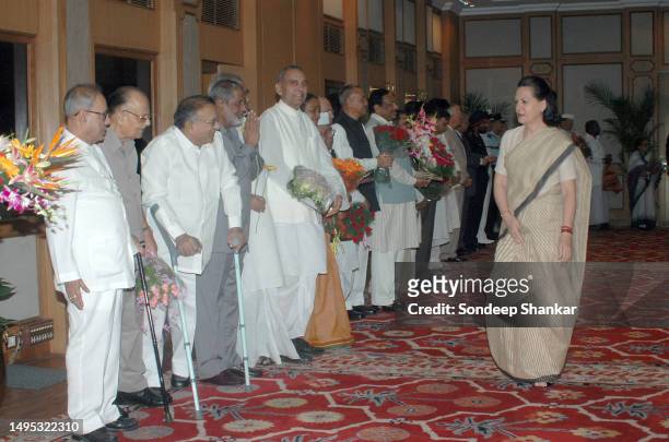 United Progresive Alliance Chairperson Sonia Gandhi meets Defence Minister Pranab Mukherjee and Human Resources Development Minister Arjun Singh,...
