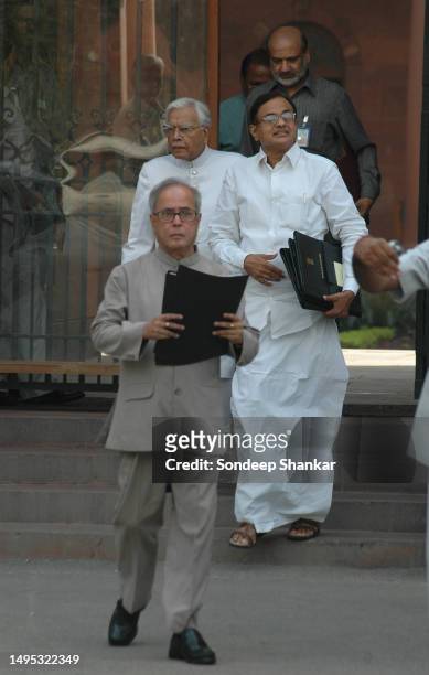 Union Finance Minister Pranab Mukherjee followed by Home Minister P Chidambaram and External Affairs Minister Natwar Singh comming out after cabinet...