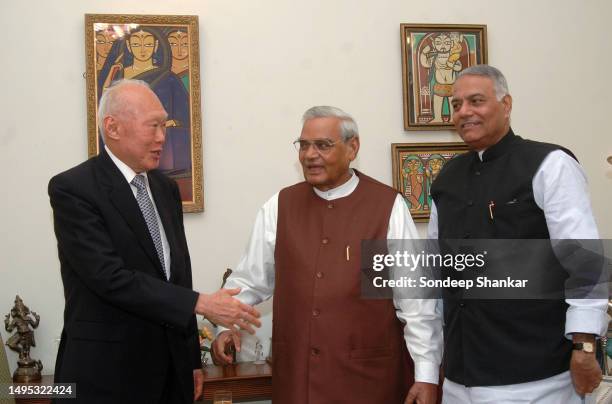 Former Prime Minister Atal Behari Vajpayee and finance Minister Yashwant Sinha with the Minister Mentor of Singapore Lee Kuan Yew during a luncheon...