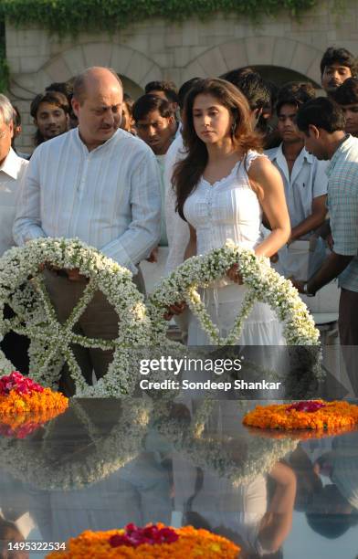 Actors Anupam Kher and Urmila Mataondkar pay their tributes at the Gandhi memorial at Rajghat in New Delhi on Thursday, September 22, 2005 for the...