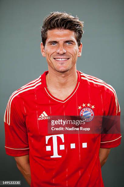 Mario Gomez poses during the Bayern Muenchen team presentation at Bayern's training ground Saebener Strasse on July 30, 2012 in Munich, Germany.Ê