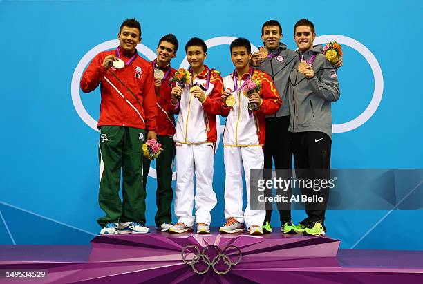 Silver medalists German Sanchez Sanchez and Ivan Garcia Navarro of Mexico, gold medalists Yuan Cao and Yanquan Zhang of China and bronze medalists...