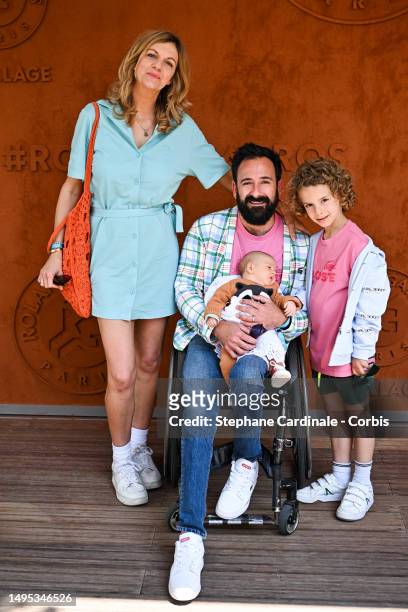Michaël Jeremiasz with family attend the 2023 French Open at Roland Garros on June 02, 2023 in Paris, France.