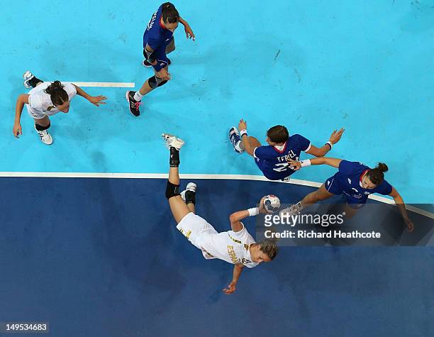 Begona Fernandez Molinos of Spain shoots at goal during the Women's Handball Preliminaries Group B - Match 10 between France and Spain on Day 3 of...
