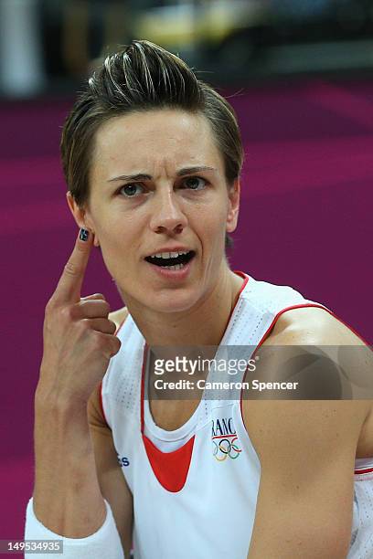 France captain Celine Dumerc questions a call during the Women's Basketball Preliminary Round match between Australia and France on day 3 of the...
