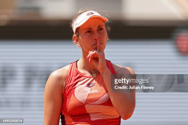 Elise Mertens of Belgium puts her finger to her lips as she celebrates a point against Jessica Pegula of United States during the Women's Singles...