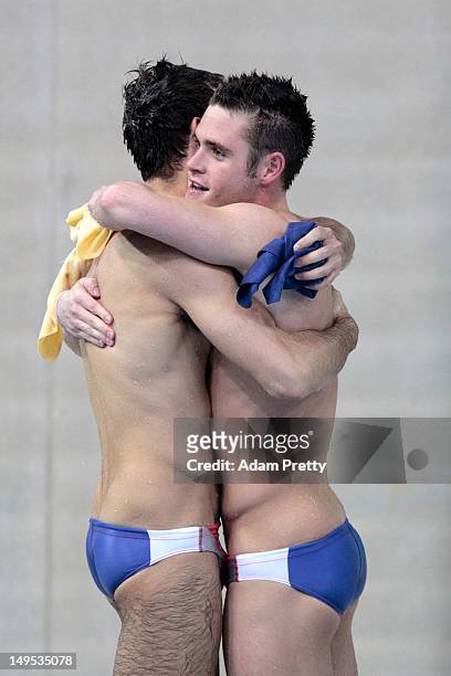 Nicholas McCrory and David Boudia of the United States look on from the pool deck as they compete in the Men's Synchronised 10m Platform Diving on...