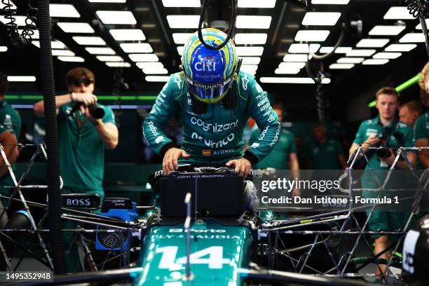 Fernando Alonso of Spain and Aston Martin F1 Team prepares to drive on the grid during practice ahead of the F1 Grand Prix of Spain at Circuit de...