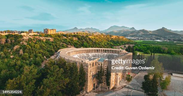aerial view of antalya aspendos ancient city amphitheater, historical destination aspendos antalya, historical places in turkey, best preserved ancient city, aerial view of aspendos ancient city, best historical roman ancient theater - amphitheatre stock pictures, royalty-free photos & images