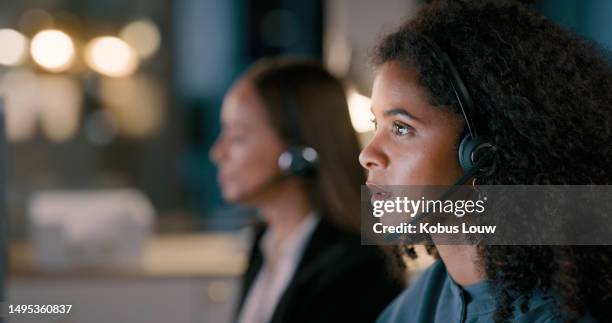 callcenter, night shift and phone call, woman in office at customer service center of help desk. telemarketing consultant, crm agent or virtual assistant working late with headset, mockup and bokeh. - callcenter stock pictures, royalty-free photos & images